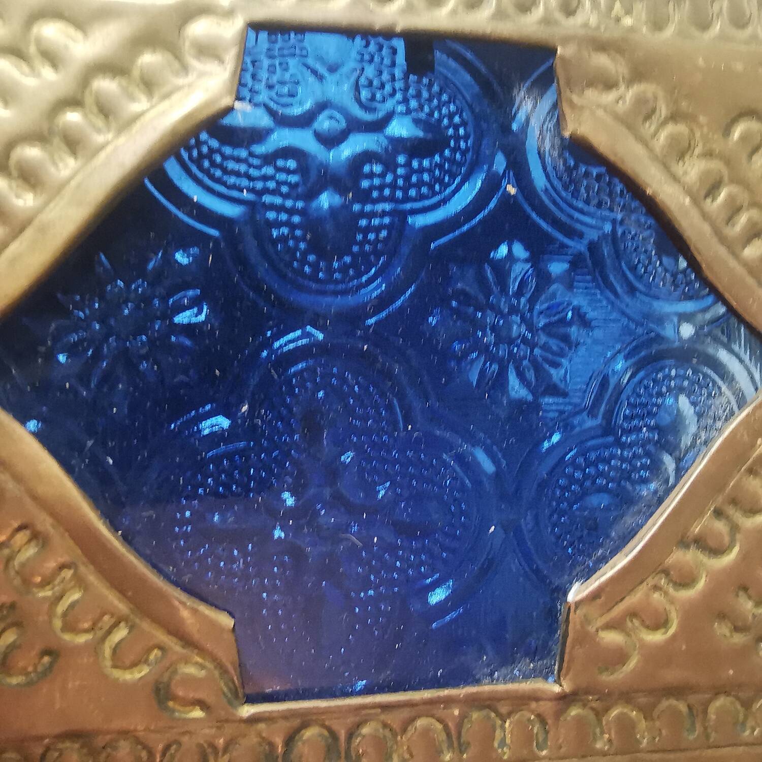 Oriental style hanging lantern in brass and dark blue glass