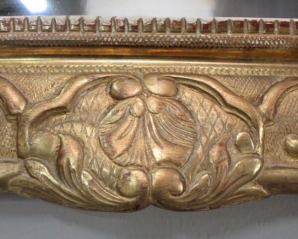 Miroir en bois doré, style régence, fin XlXe