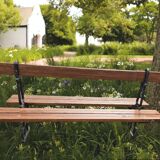 Antique double garden bench from the city of Paris in cast iron and wood