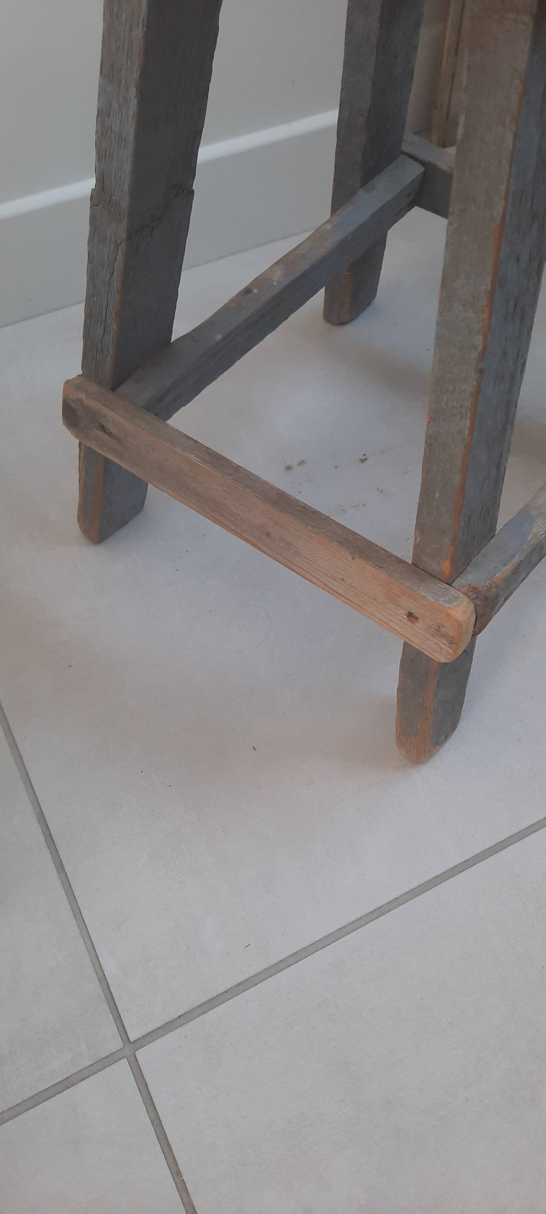 Antique wooden stool in the brutalist style