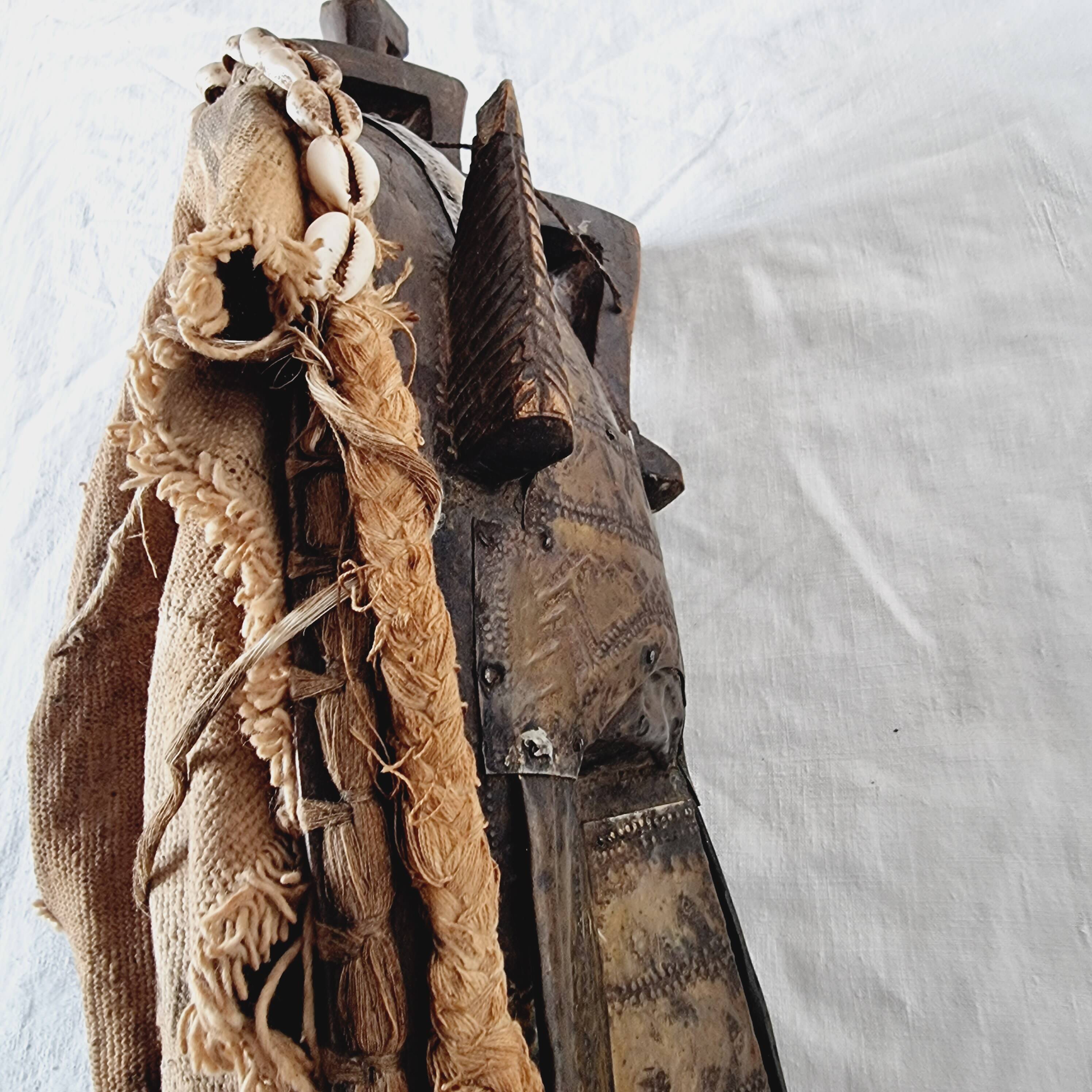 African mask from Mali from the N'Tomo tribe of Marka covered in chiseled brass
