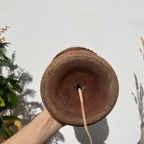 Foot of turned wooden lamp and carved