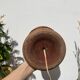 Foot of turned wooden lamp and carved