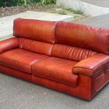 3-seater burgundy leather sofa convertible into a 2-seater bed 1940