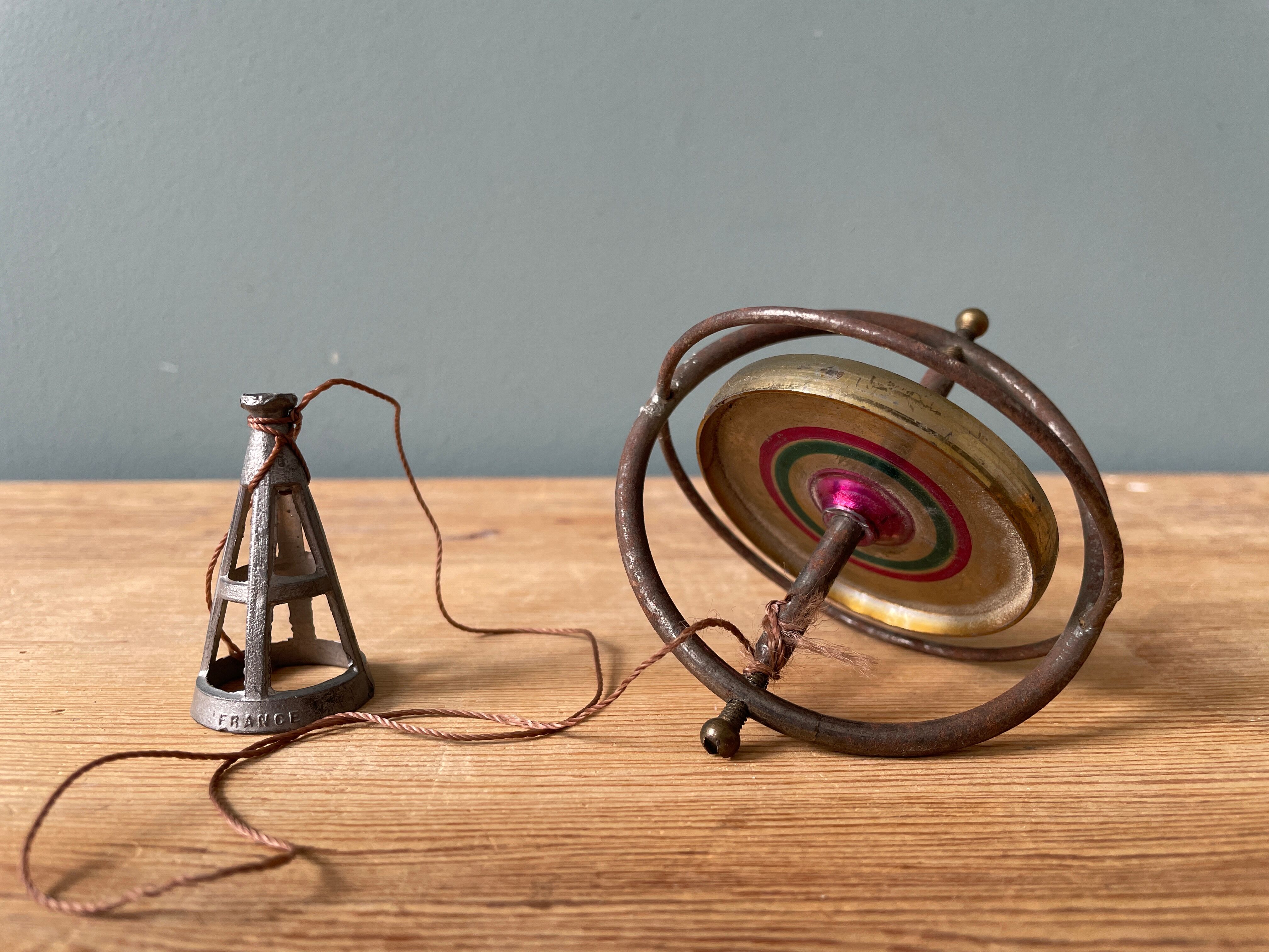 Old gyroscope spinning top