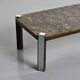 Fossil stone and chrome metal coffee table, Fossile Collection, Switzerland, circa 1980.