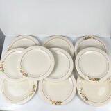 Set of 10 flat plates Longwy, 20th century, floral decoration.