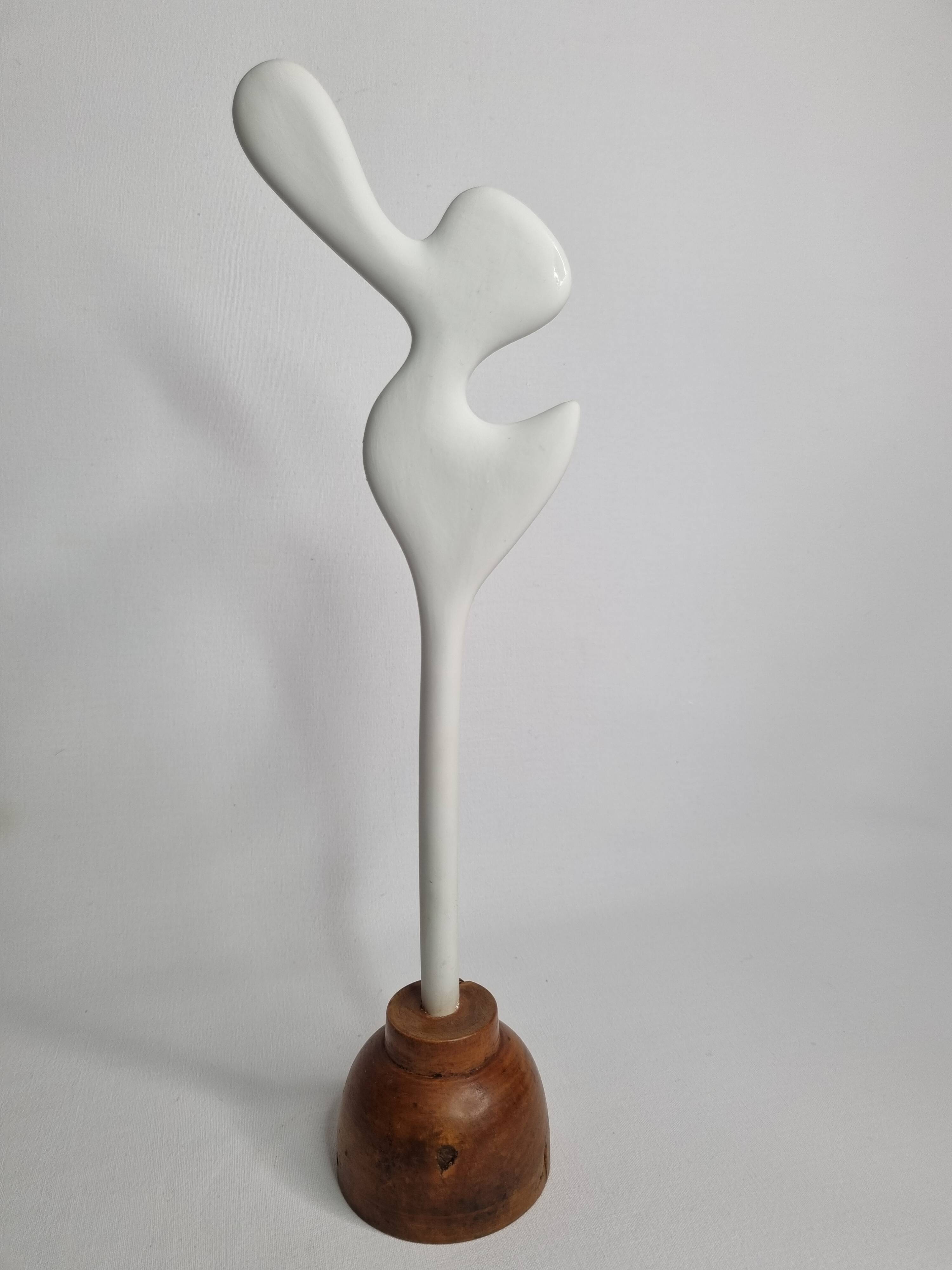 Biomorphic-inspired sculpture, on an industrial wooden base, 37 cm