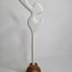 Biomorphic-inspired sculpture, on an industrial wooden base, 37 cm