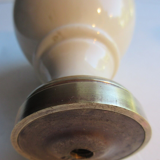 Twentieth art deco staircase ball in beige porcelain and gilded brass