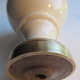 Twentieth art deco staircase ball in beige porcelain and gilded brass