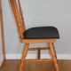 4 BAUMANN Tacoma chairs in black imitation leather and light beech