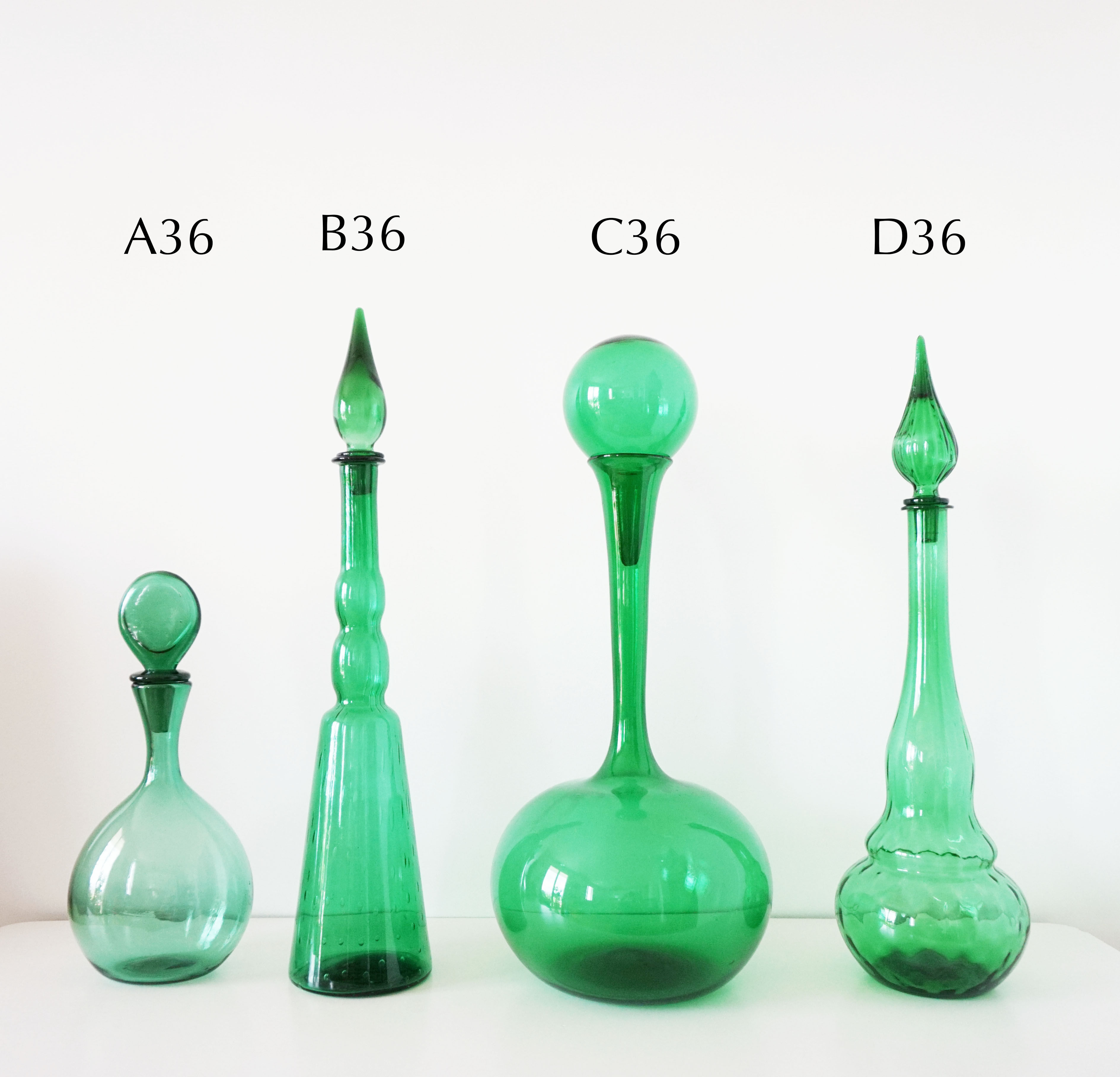 Italian bottle or decanter in green blown glass empoli