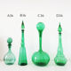 Italian bottle or decanter in green blown glass empoli