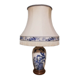 Ceramic lamp with Asian decoration with matching lampshade.