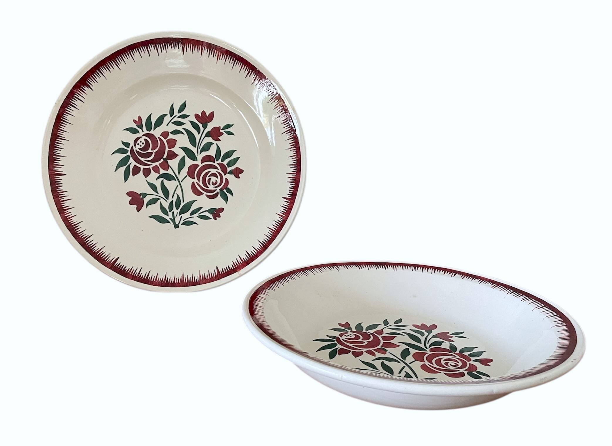 Antique plates and salad bowls in Longwy faience.