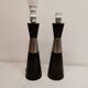 Two table lamps made of dark-stained wood with silver detail in the middle.