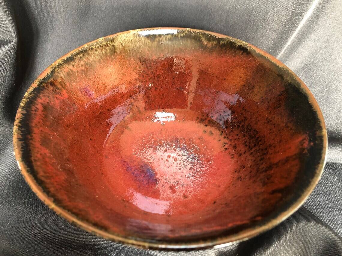 Oxblood enameled ceramic cup signed LS
