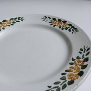 Plat rond à pied ancien signé Labrut frères fleurs