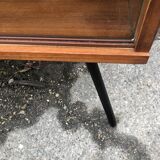 Library showcase with sliding glass doors 60s