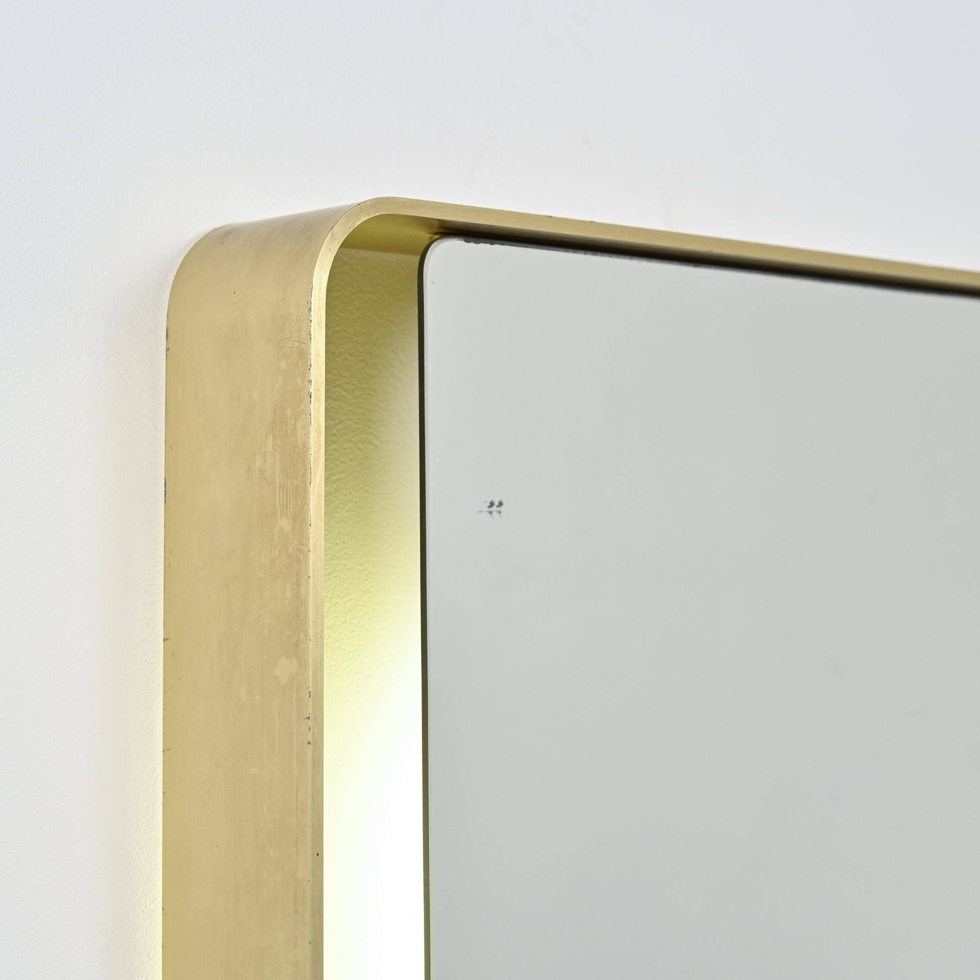 Rectangular mirror in gilded metal, circa 1970