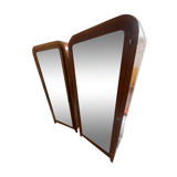 Pair of rounded mirrored wardrobes