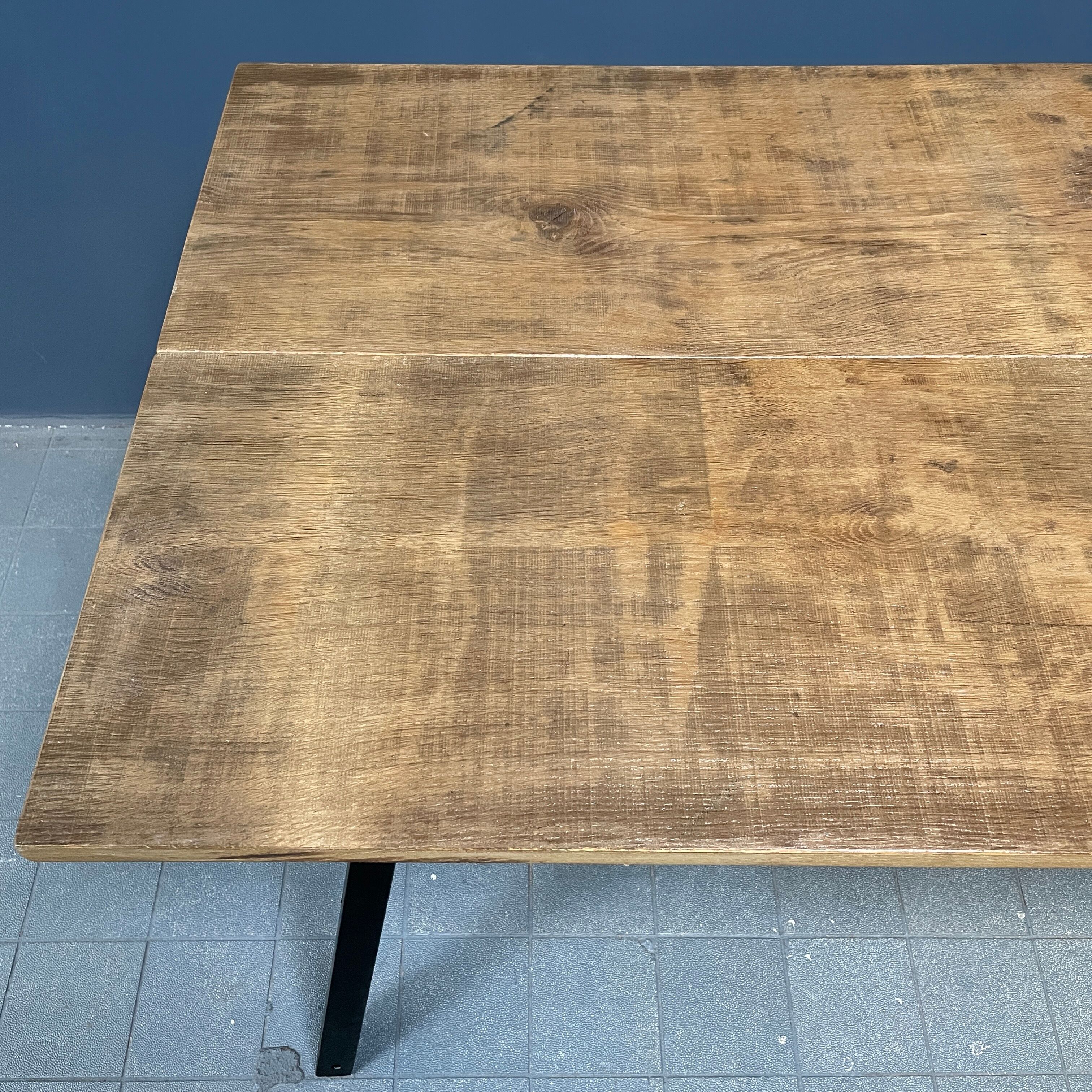 Handmade industrial oak dining table with black metal legs