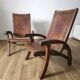 Leather and teak armchairs, by Angel Pazmino, circa 1960.