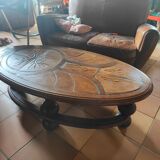 Ceramic and wood table in the shape of trees in the style of capron style