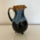 Flamed blue tripod jug