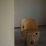 Sculptural Norwegian trunk chair in mid-century brutalist solid wood.