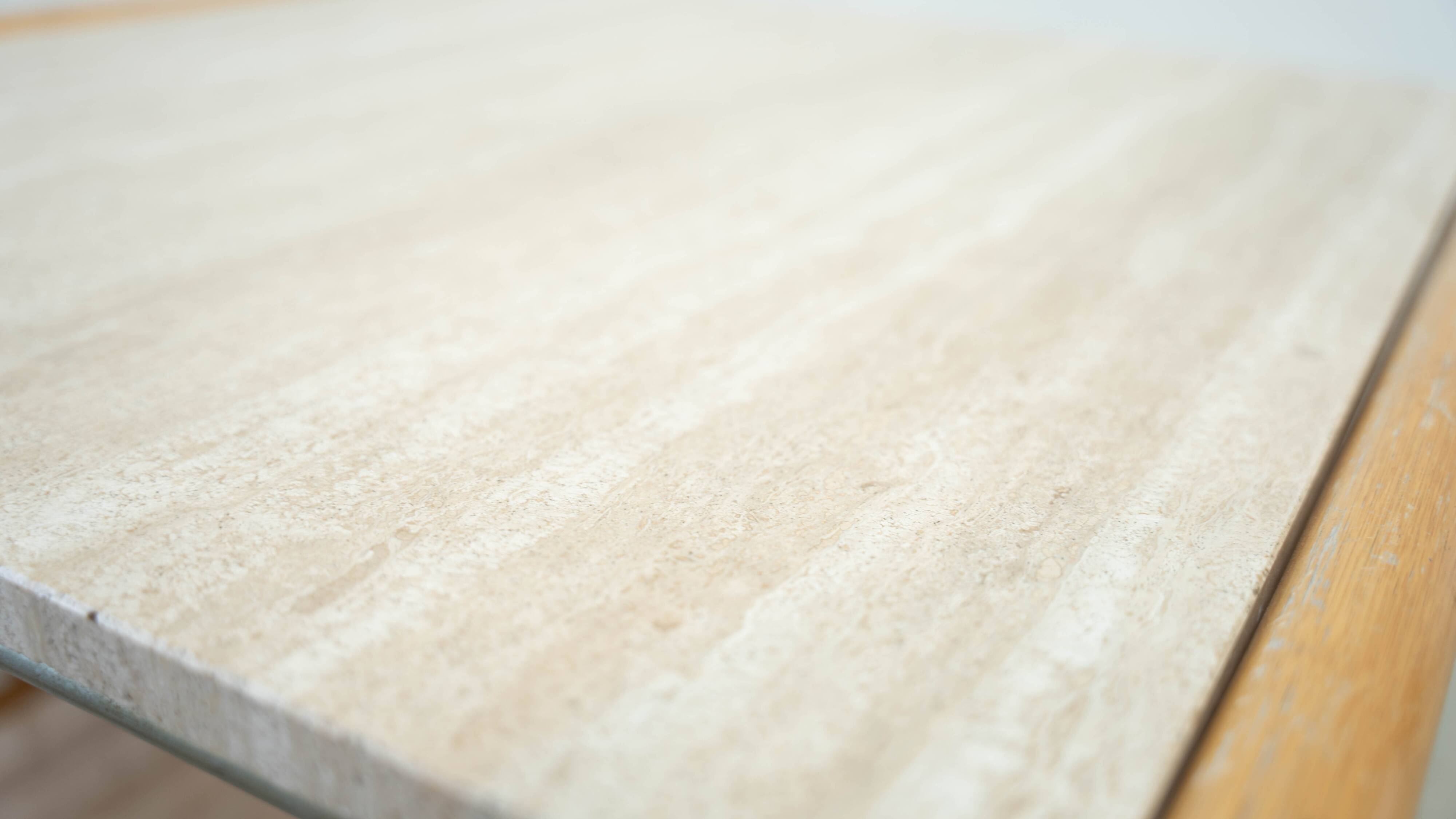 Travertine and rattan coffee table