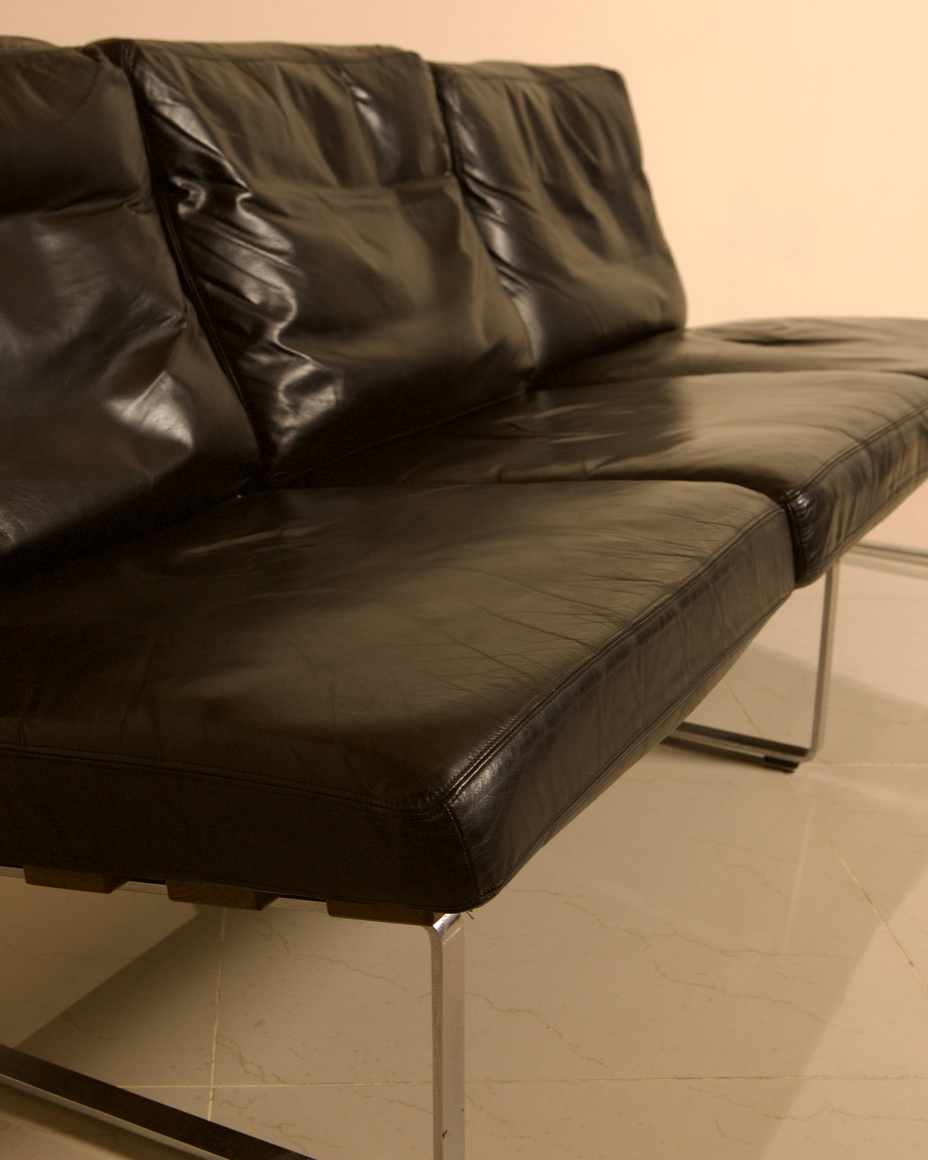 Unique Dutch bench in black leather with a steel and wenge structure from the 60s.