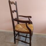 Wooden armchair with straw seat