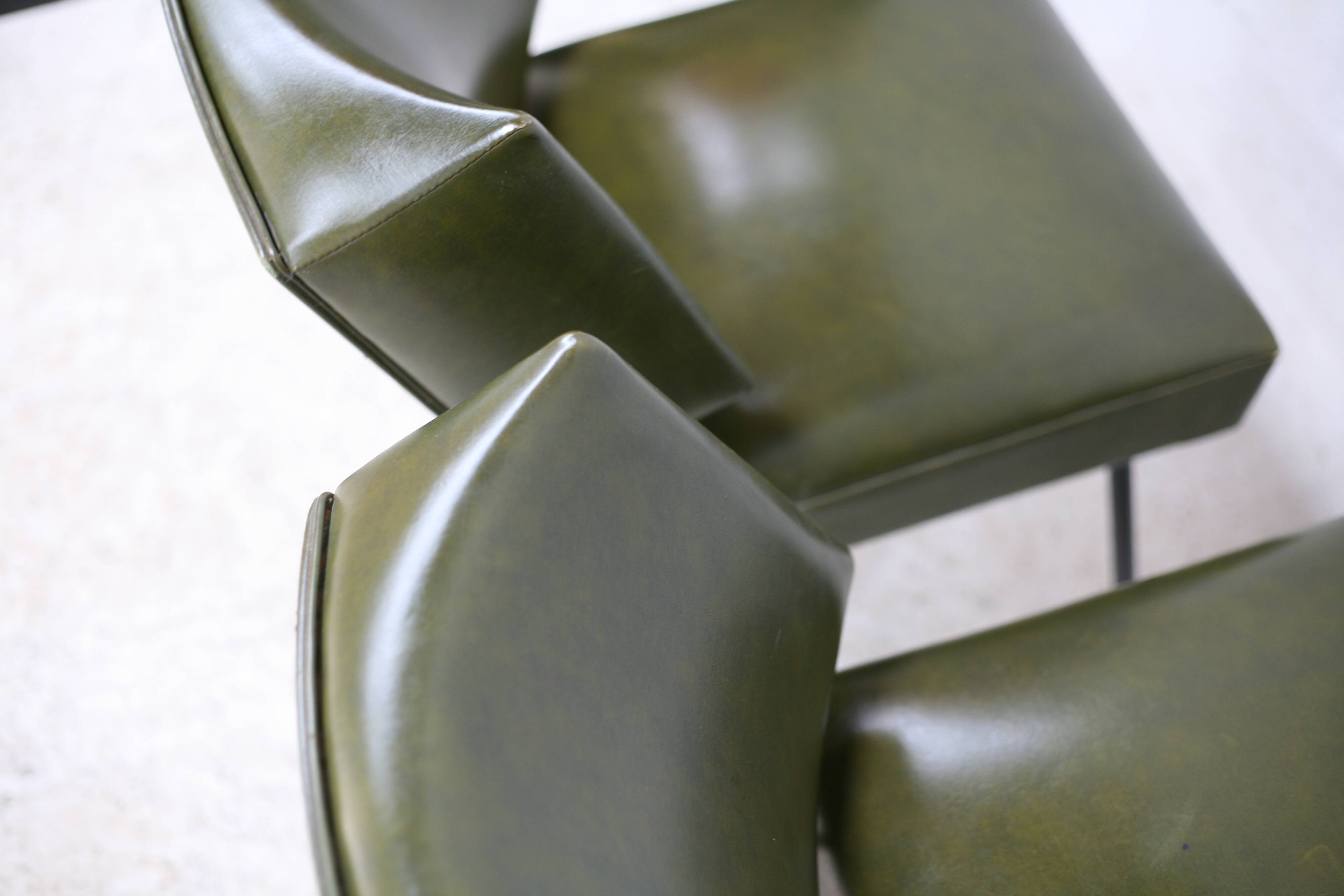 Pair of tubular armchairs, imitation leather. Circa 1950