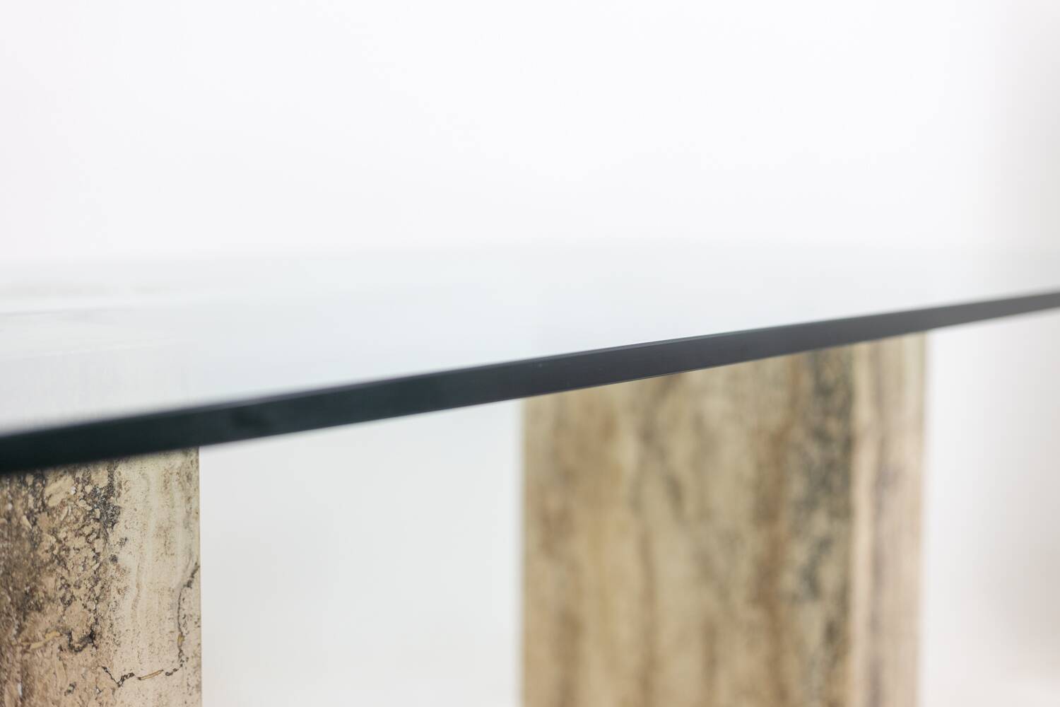 Console, or desk, in glass and travertine. 1980s.