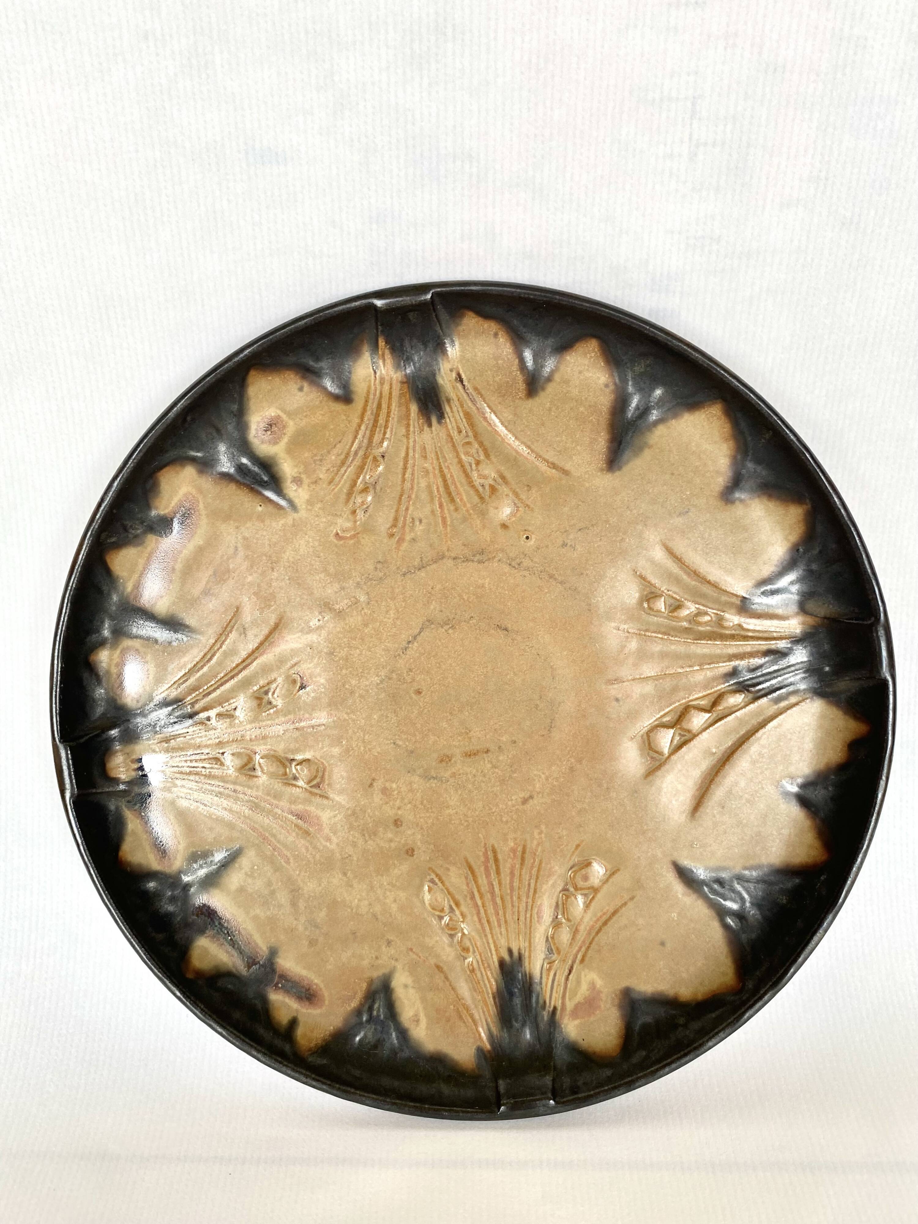 Denbac plate, flame-decorated ceramic