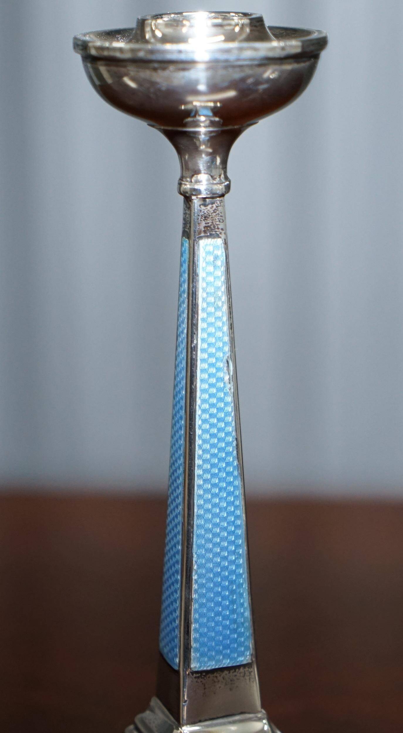 Pair of sterling silver and enamel candlesticks 1927 by Charles Green & Co.