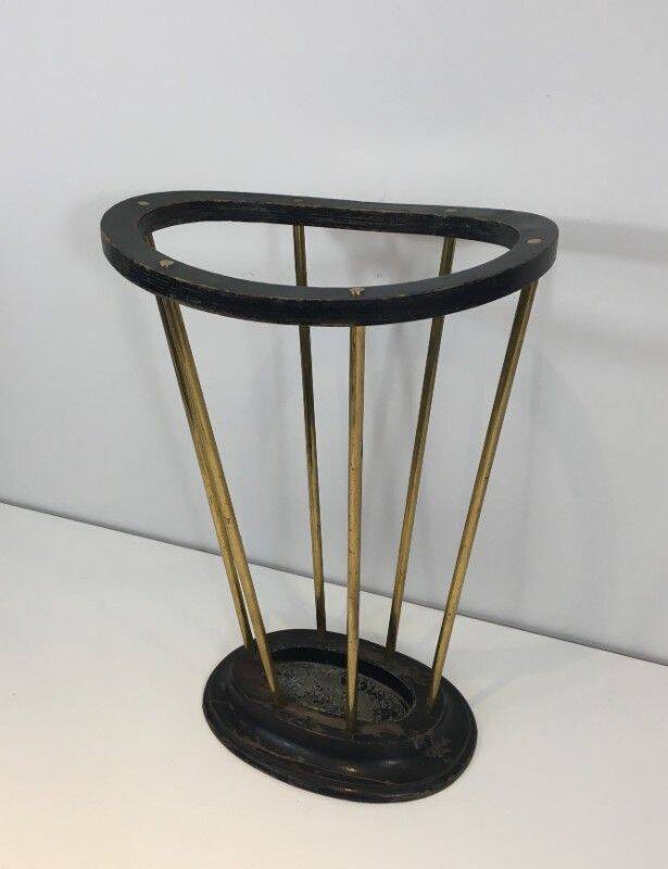 Umbrella stand in blackened wood and brass. Attributed to Jacques Adnet