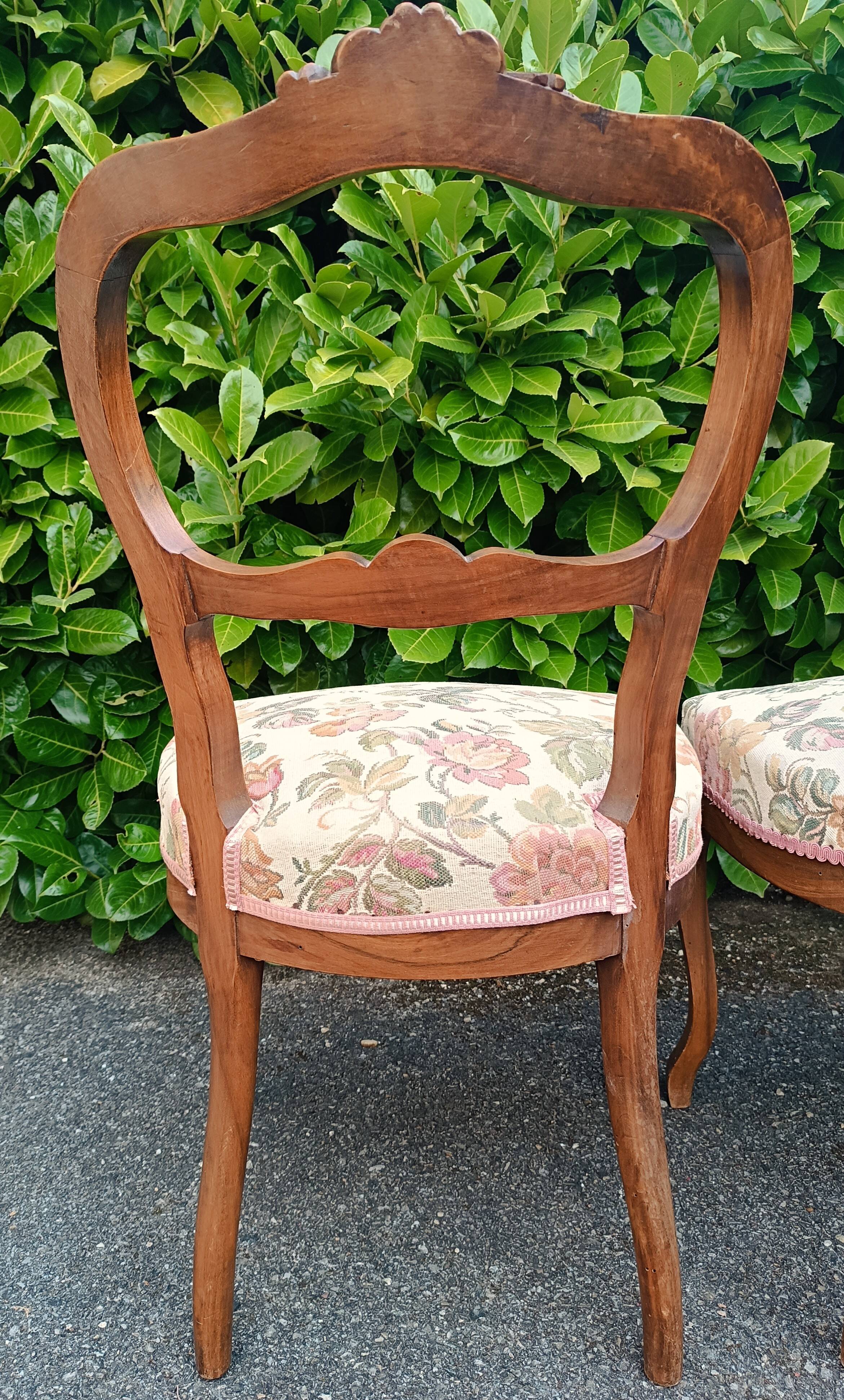 Pair of Louis XV chairs in carved walnut.