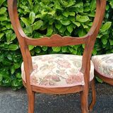 Pair of Louis XV chairs in carved walnut.