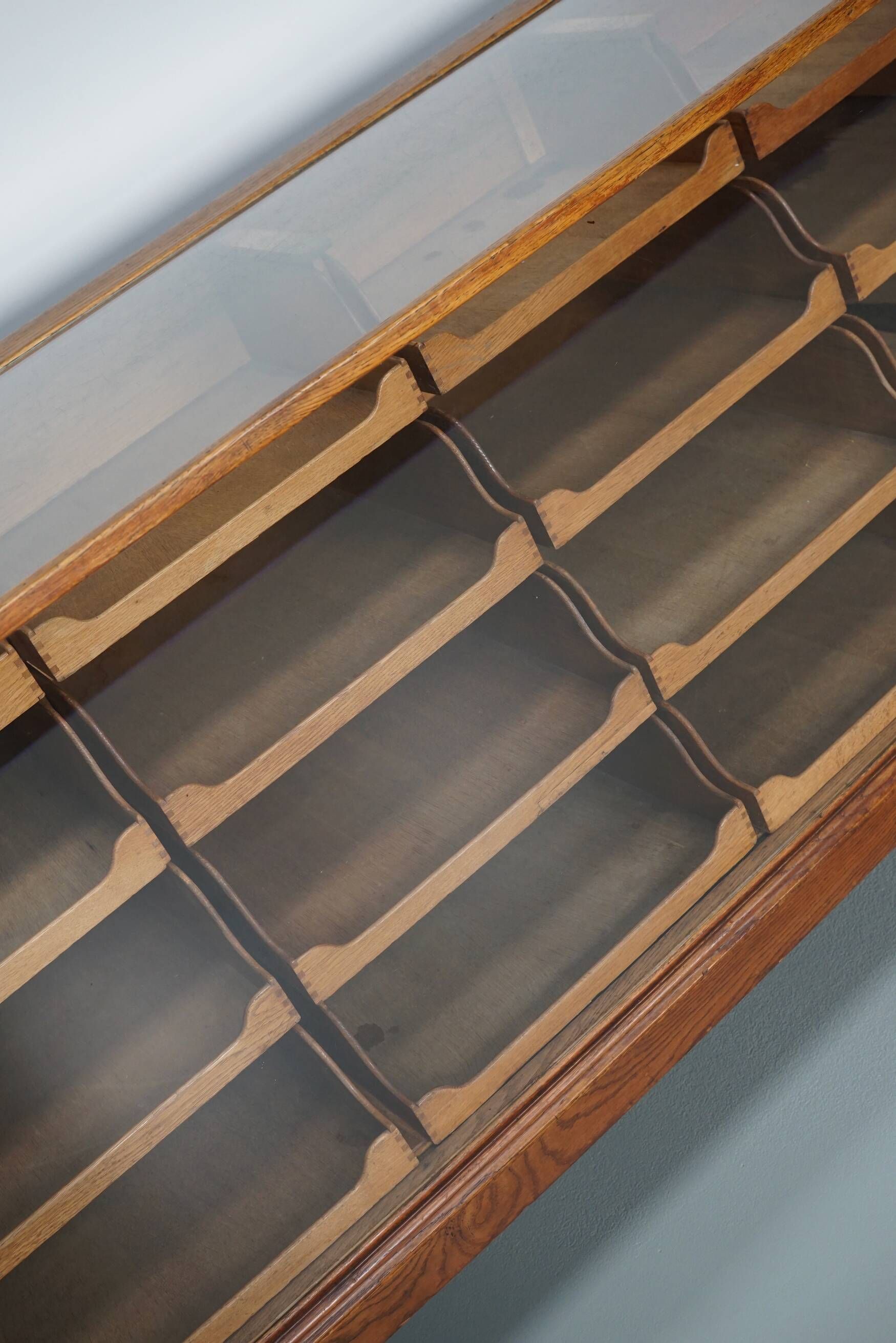Antique English oak and glass counter/display cabinet, circa 1920-1930
