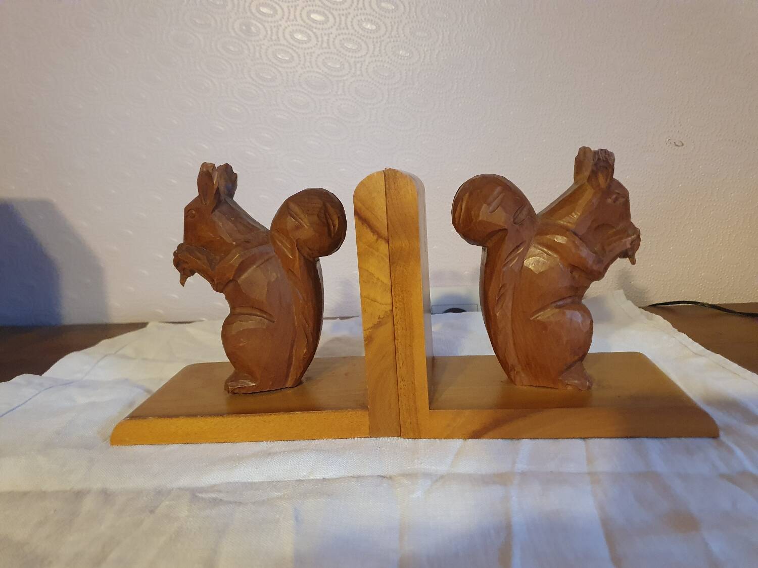 Vintage hand-carved wooden squirrel bookend