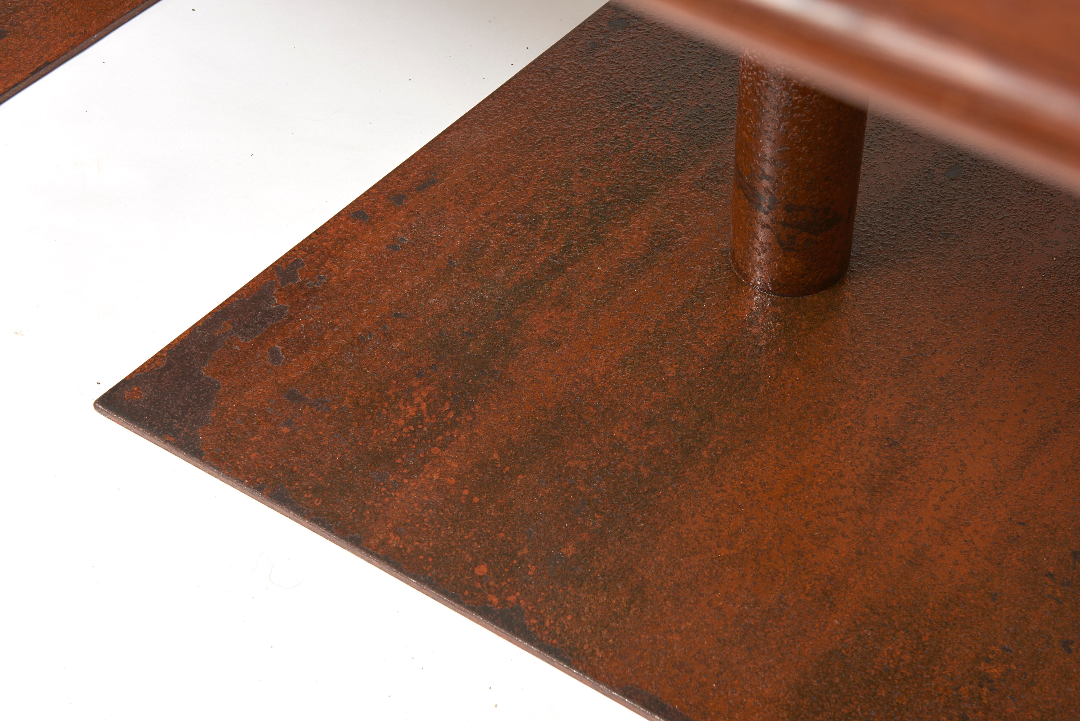 Brutalist conference table made of wood and steel