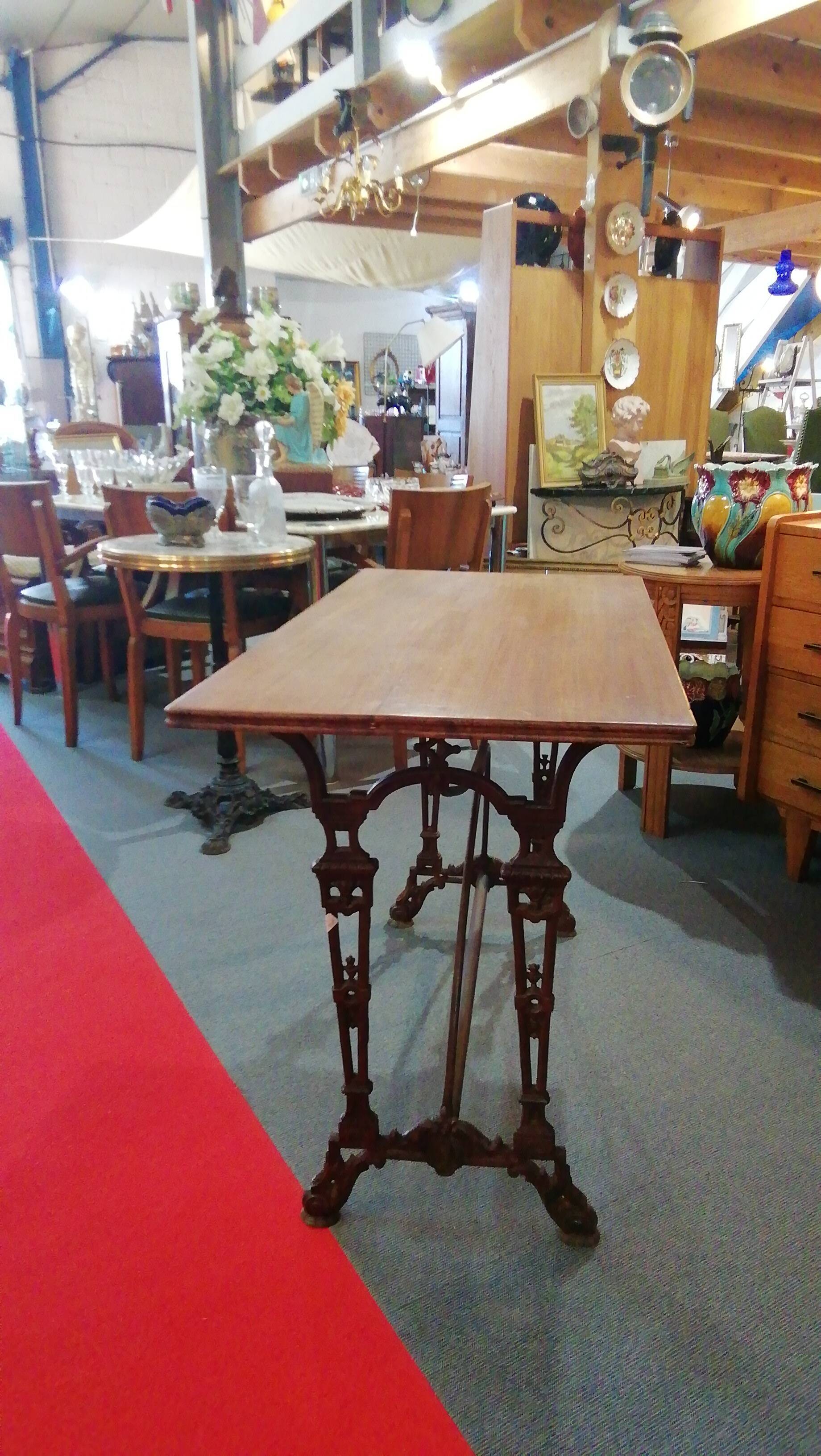 Bistro table over wood cast iron legs