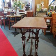Bistro table over wood cast iron legs