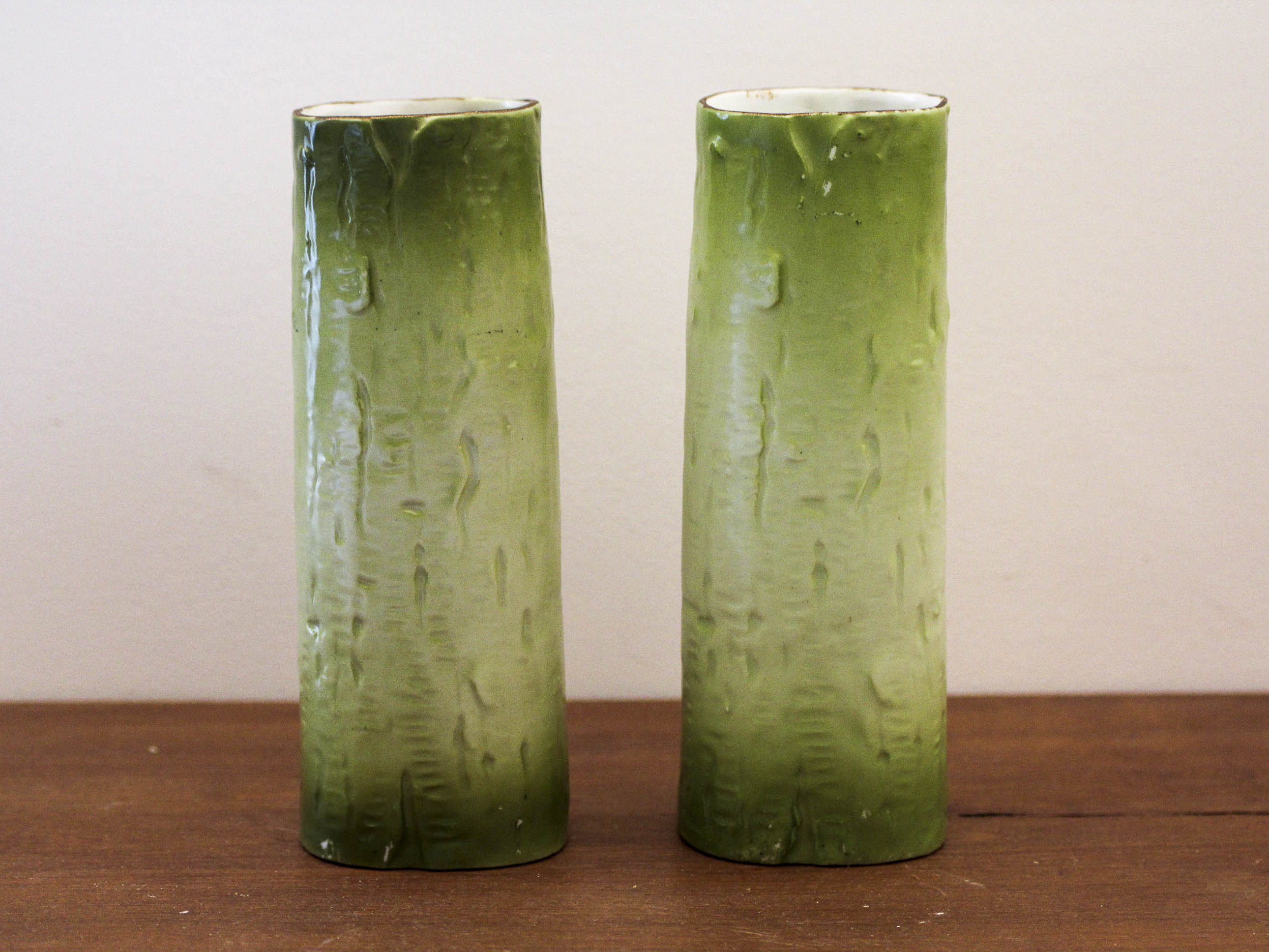 Pair of porcelain vases with portrait decoration of a woman