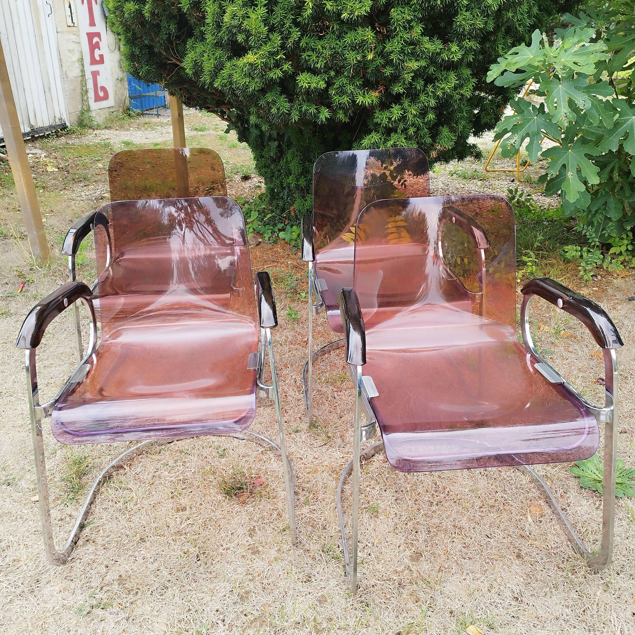 70s Space Age plexiglass chairs