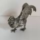 Duo of silver-plated roosters