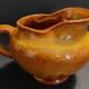 20th century glazed terracotta cream pitcher